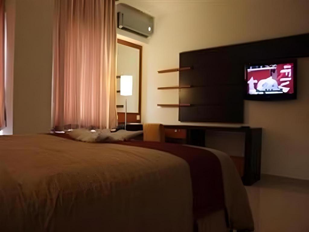 Travello Hotel Manado Exterior photo